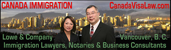 Vivien Lee,  Canada Immigration Consultant with Jeffrey Lowe, Business-Immigration Lawyer  in front of their view of downttown Vancouver from 777 West Broadway Offices of Lowe &  Co. - CLICK TO CANADAVISALAW.com website 