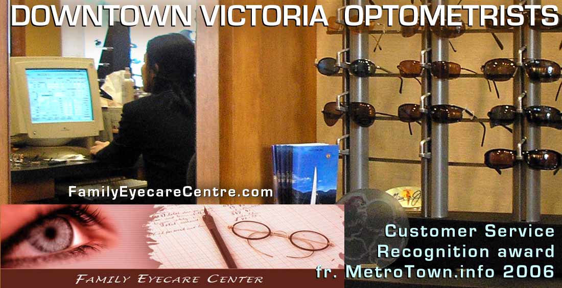 Optometrist Centre  dispensing staff at work on computer at Victorias downtown FAMILY EYECARE CENTRE ON YATES  ST.