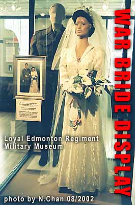 War Bride - bridal gown - from Ration Clothing Coupons in display case in Edmonton Military Museum