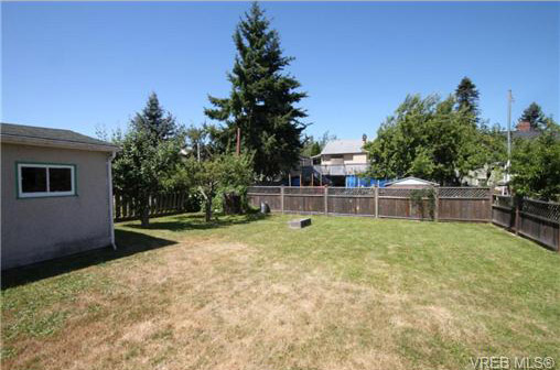 view of back yard from house -of this Tillicum area of   Victoria Region, BC